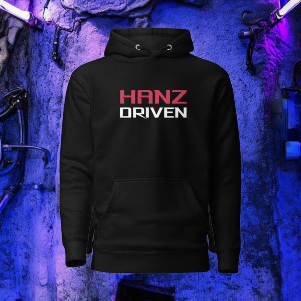Hoodie hanging on a cool looking car tuning garage rough wall