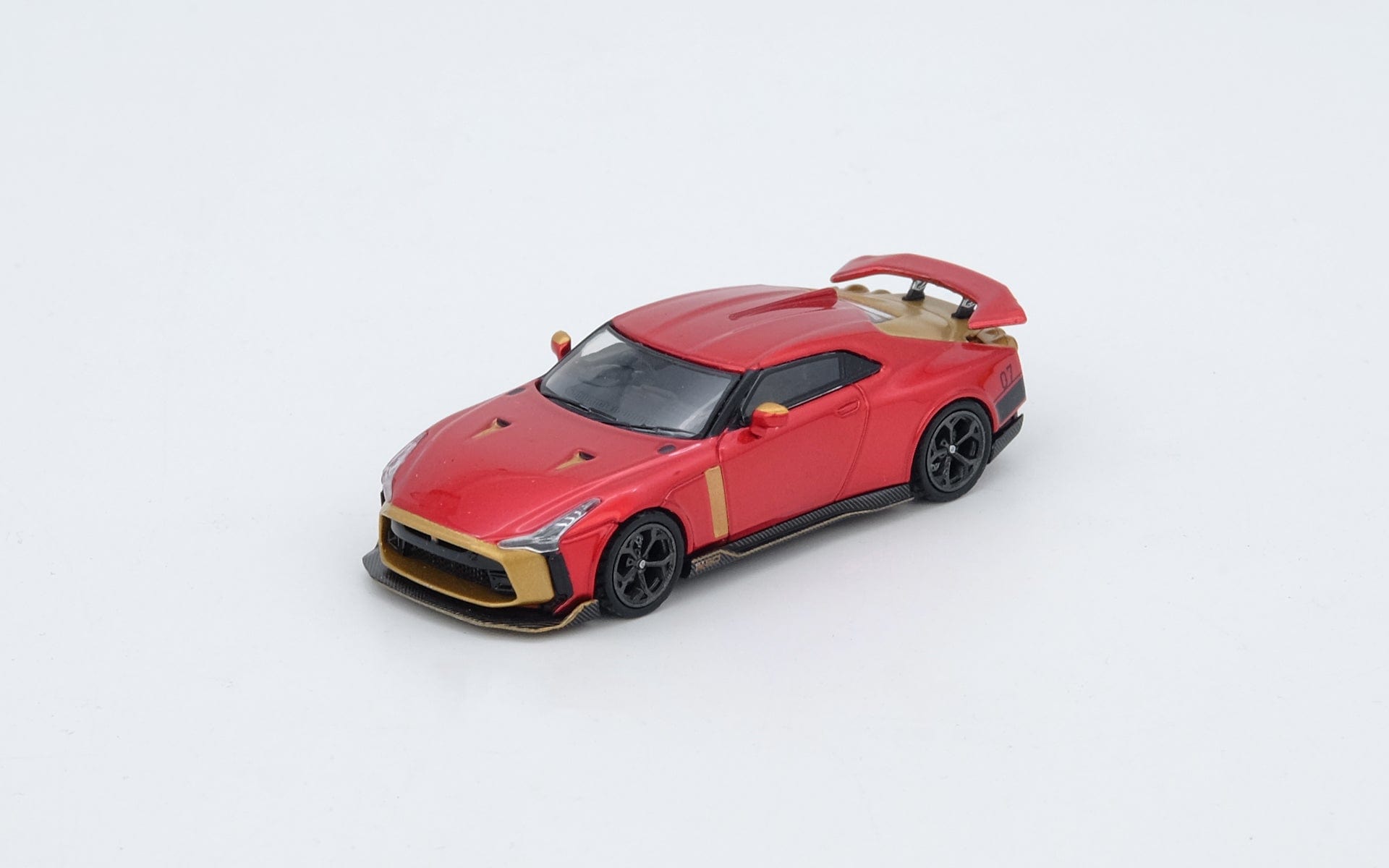 Nissan GT-R R50 by Italdesign Red Iron Man Inno64 1/64 scale